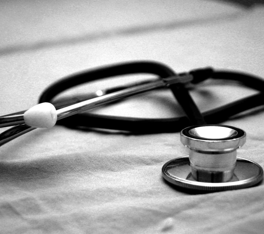 A black and white photograph of a stethoscope